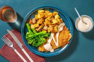 Cajun crumbed sea bass and paprika potatoes recipe